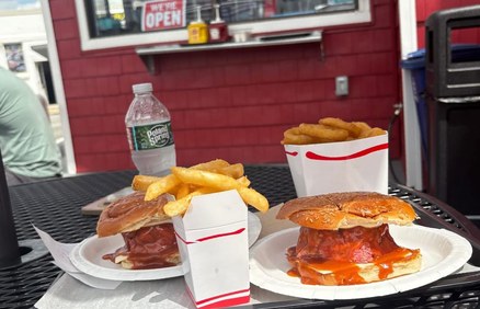 A tray of North Shore roast beef sandwiches and fries.